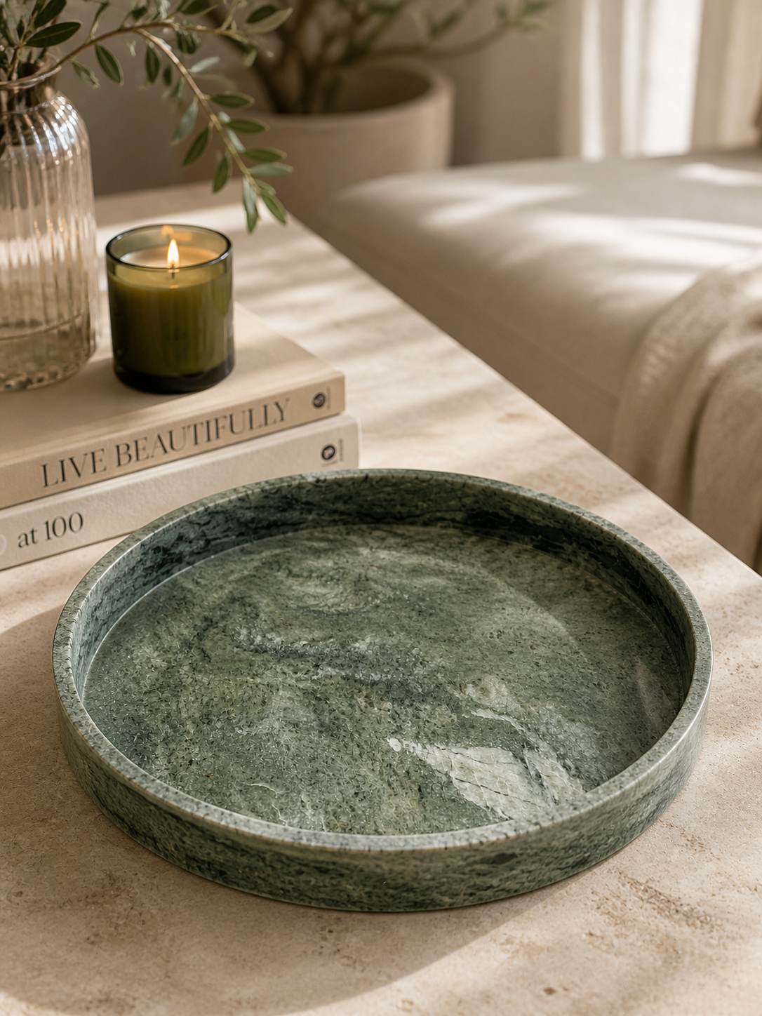 Jade Green marble tray on display with a candle and books