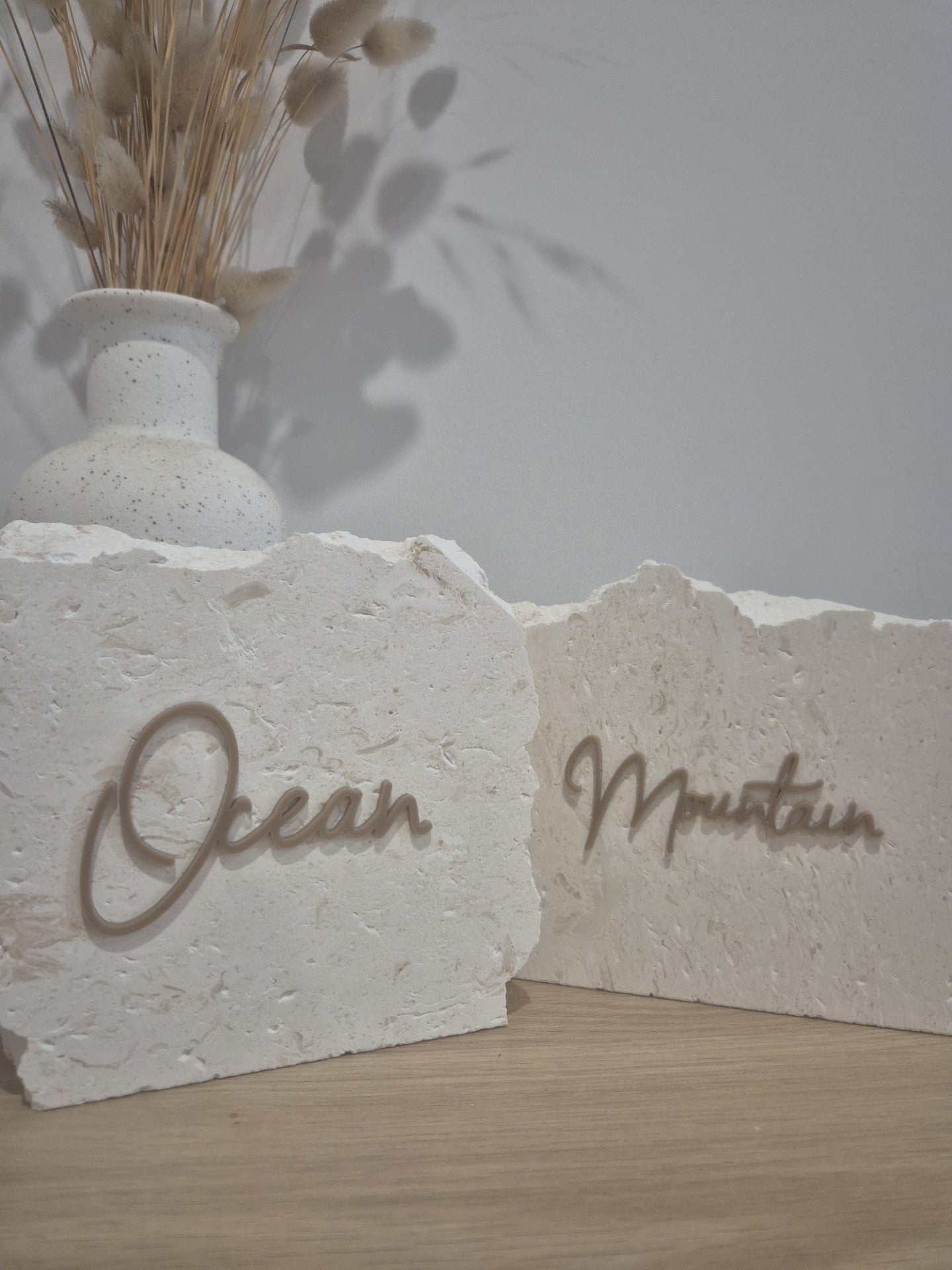 Limestone sign with cappuccino acrylic lettering